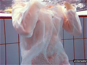 super-cute red-haired plays naked underwater