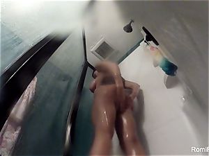 sex industry star Romi Rain brings her camera in the bathroom