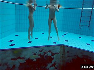 steamy Russian girls swimming in the pool
