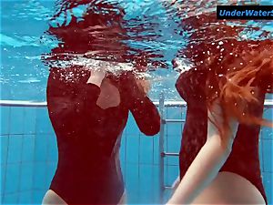 two super-hot teens underwater