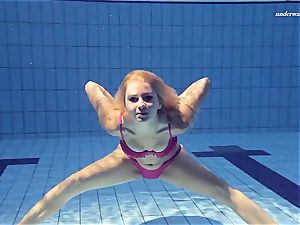 warm Elena flashes what she can do under water